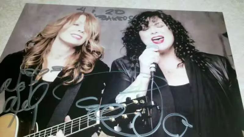 a person holding a guitar