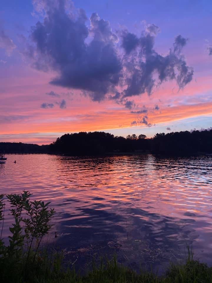 a sunset over a body of water