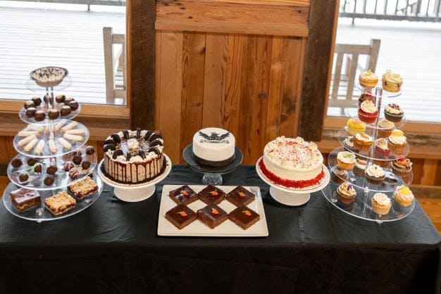 a cake sitting on top of a wooden table