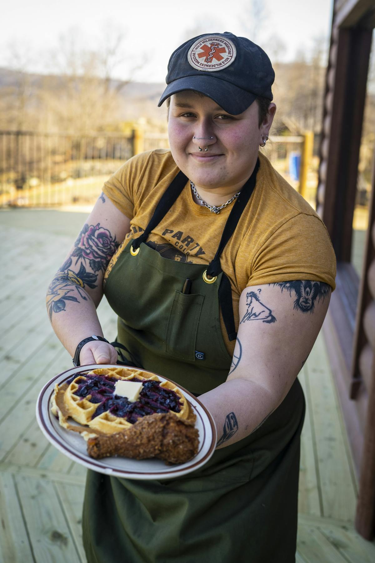 a man holding a piece of cake