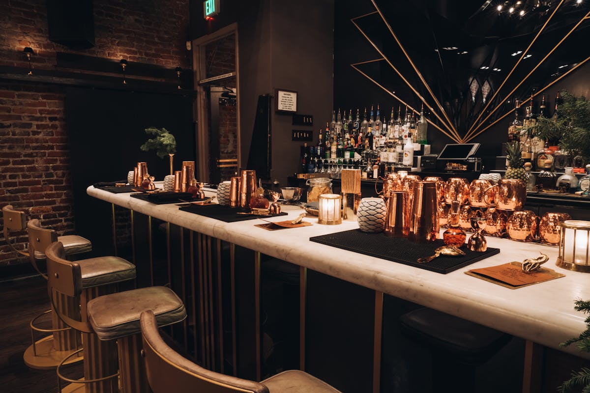 a kitchen with a table in a restaurant