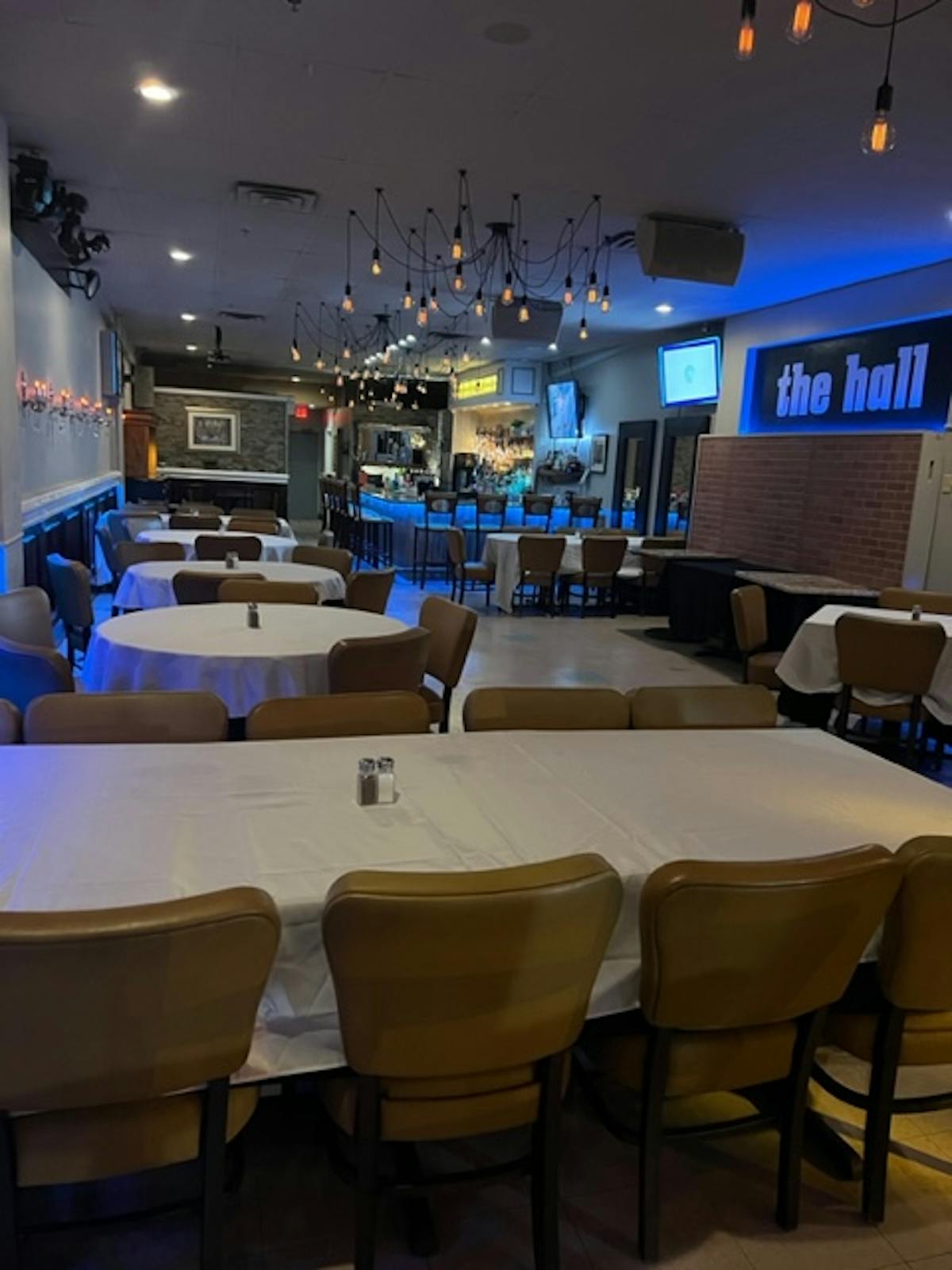 a group of people sitting at a table in a room