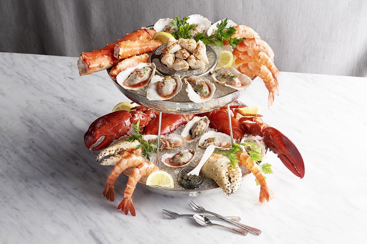 a plate of lobster with shrimp