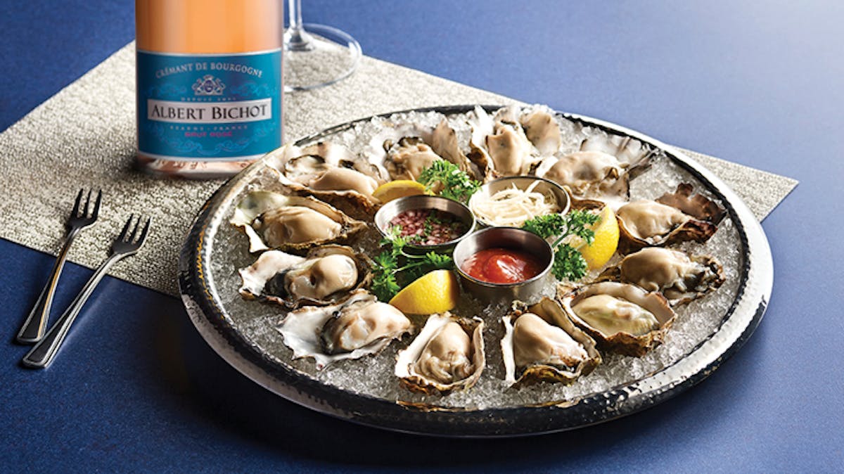a plate of oysters on a table