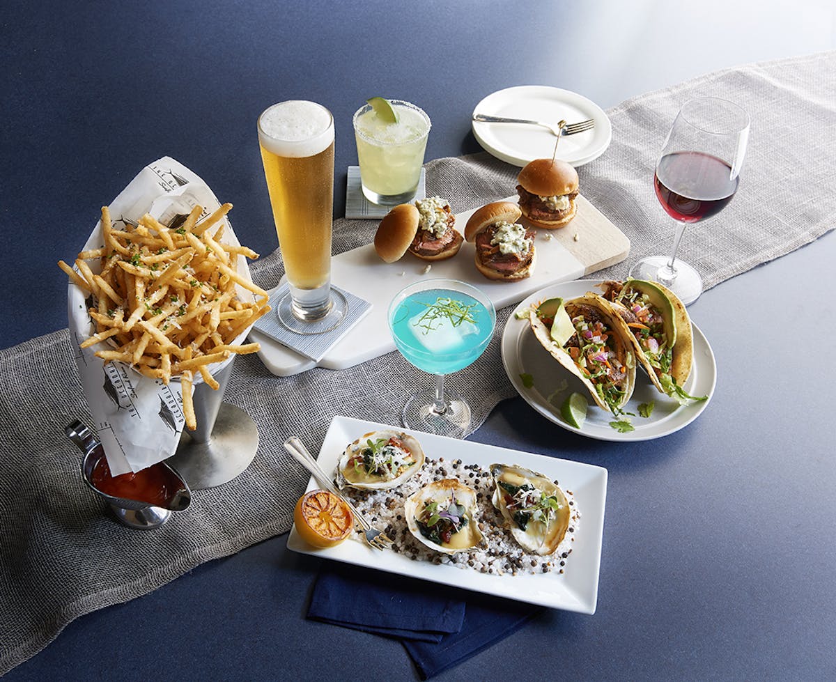 a table topped with plates of food on a plate