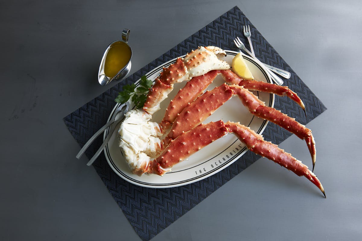 a crab plate with mashed potatoes