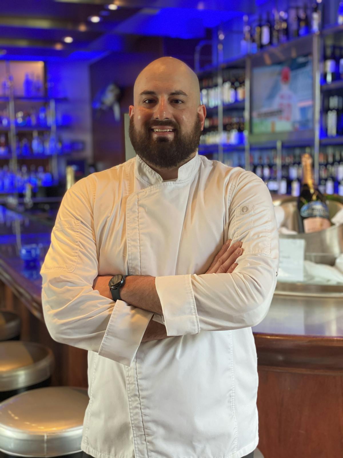 a man standing in front of a store