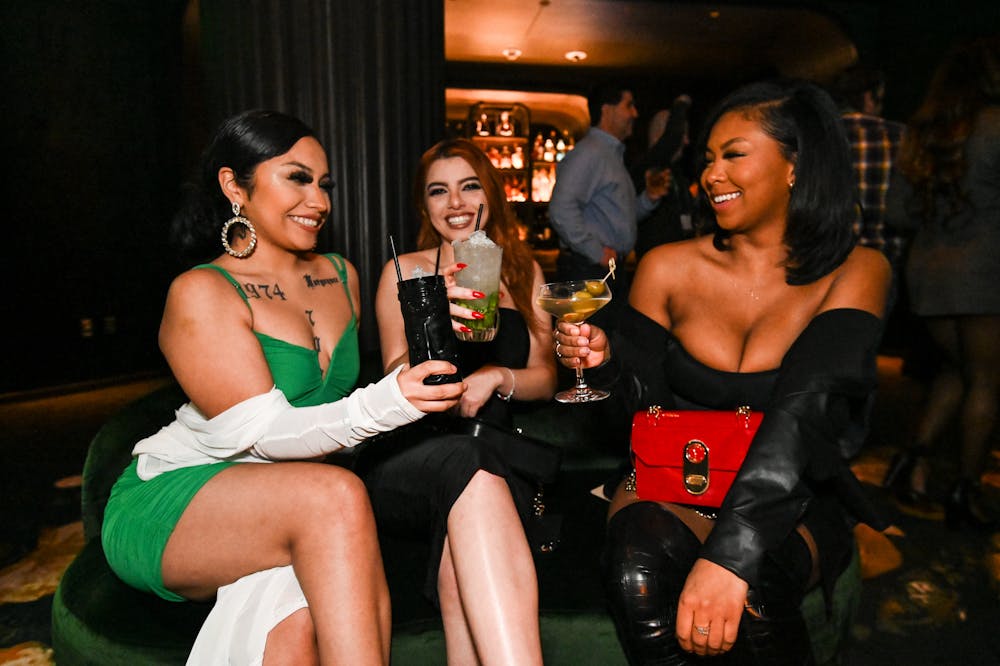 girls enjoying cocktails and Las Vegas speakeasy