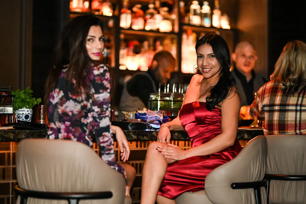two ladies sitting at las Vegas cocktail Lounge Easys