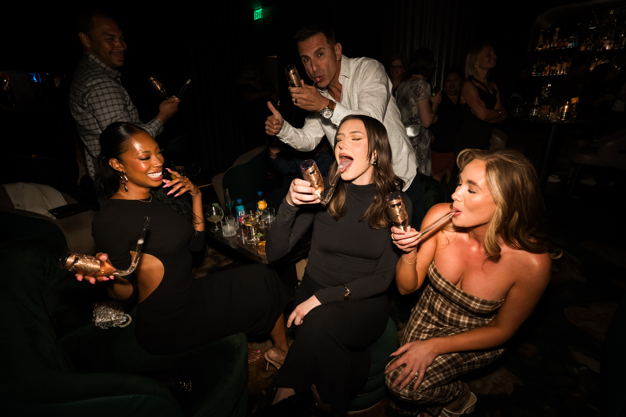 girls sipping champagne bongs at easy cocktail lounge