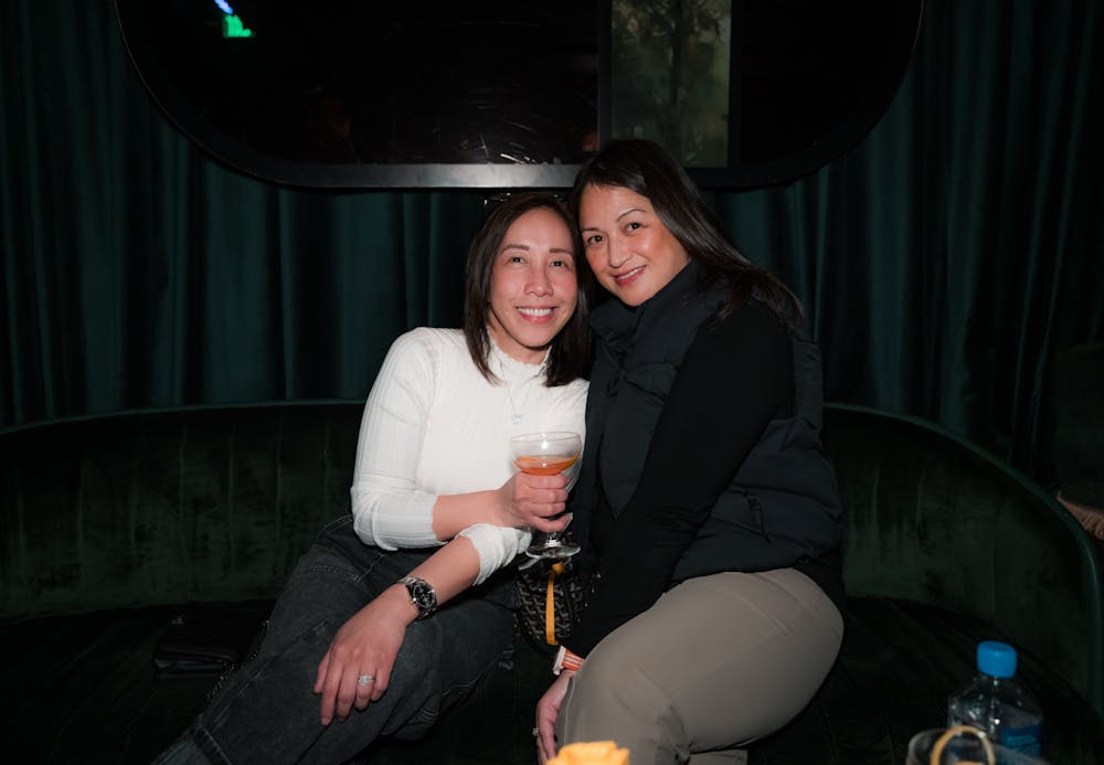 two ladies enjoying cocktails inside Las Vegas speakeasy Easys cocktail llounge