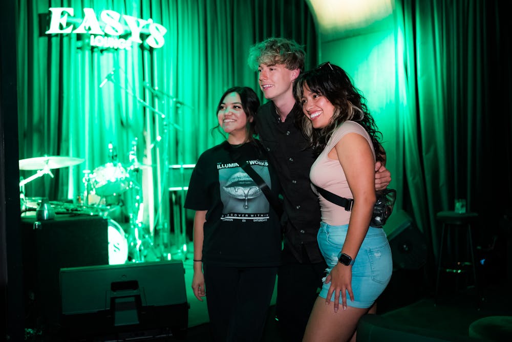 Mackenzie Sol with fans at Las Vegas speakeasy Easys Cocktail Lounge