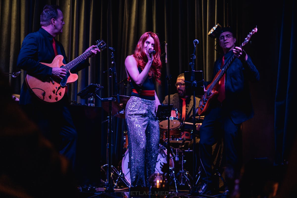 Red Penny Arcade performing live music at Easy's Cocktail Lounge