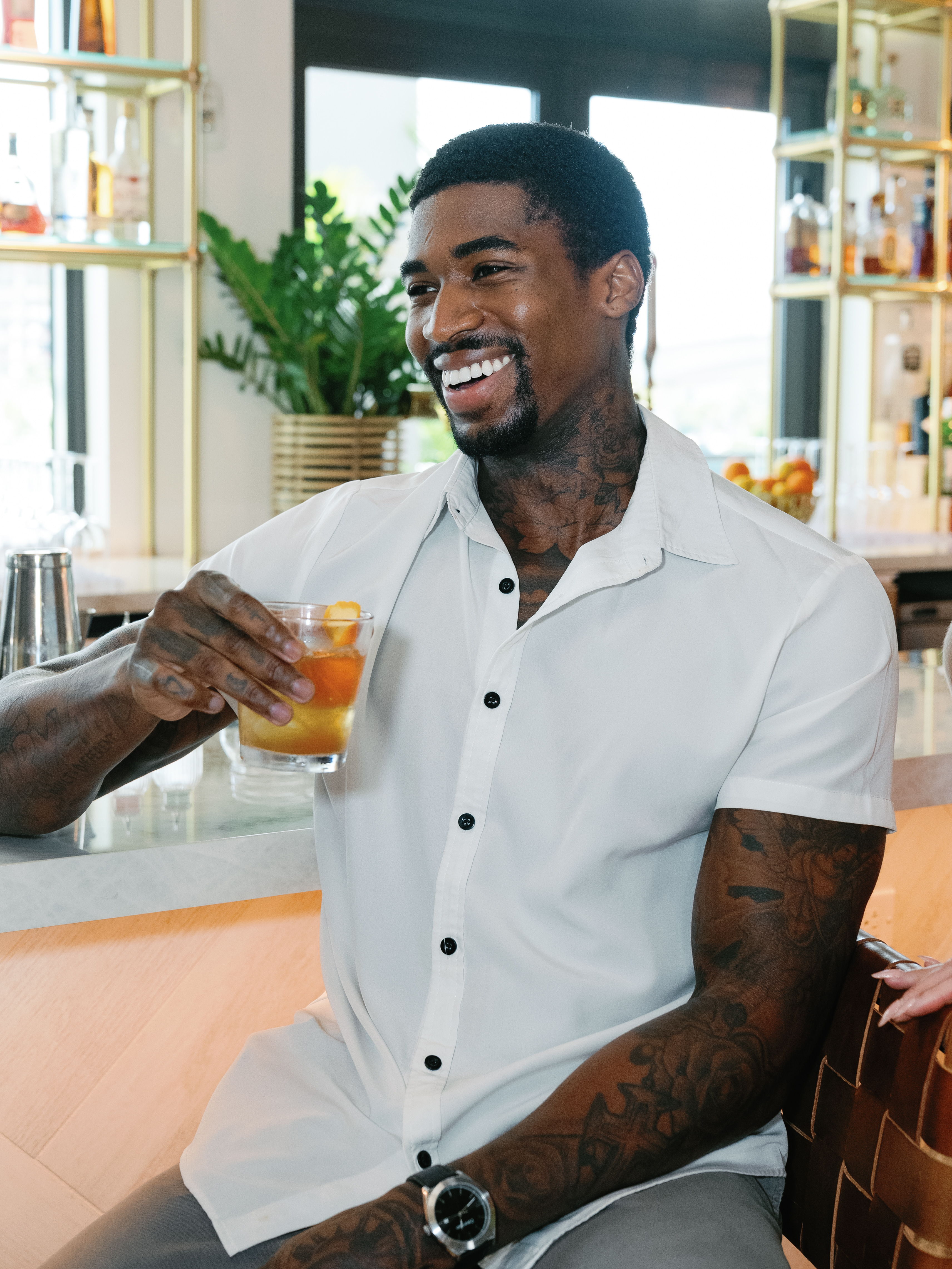 a man holding a donut