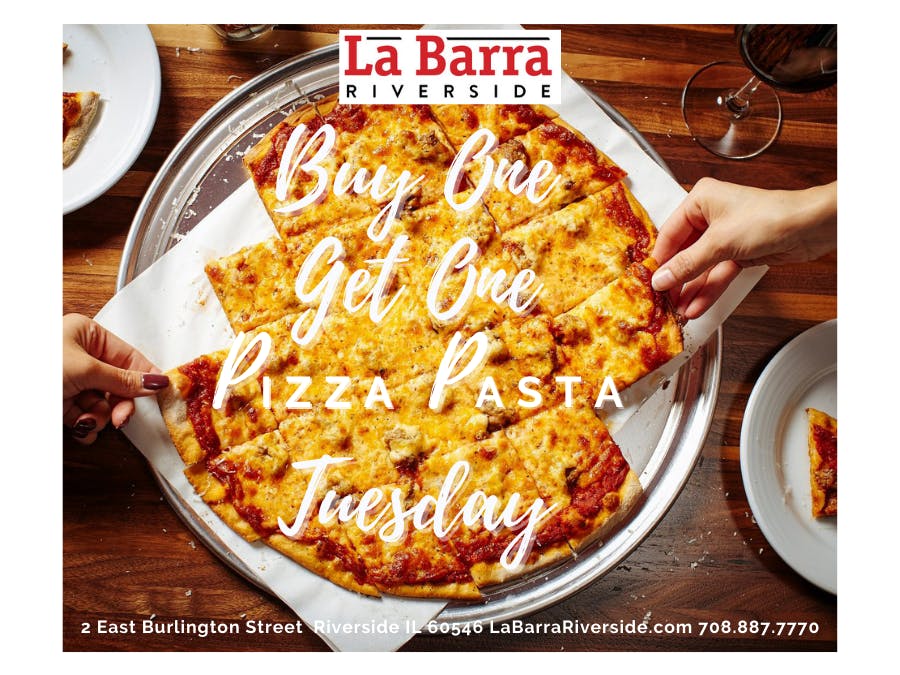 a pizza sitting on top of a plate of food