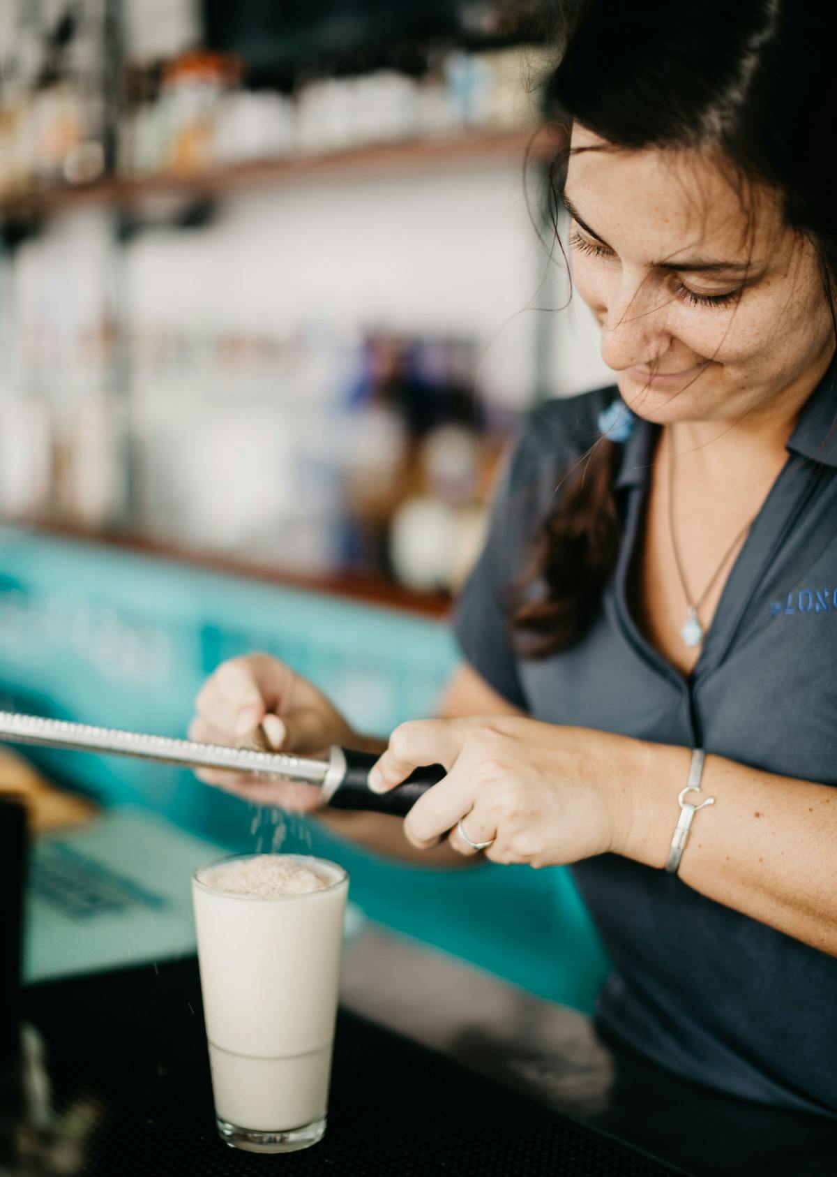 a person holding a cup of coffee