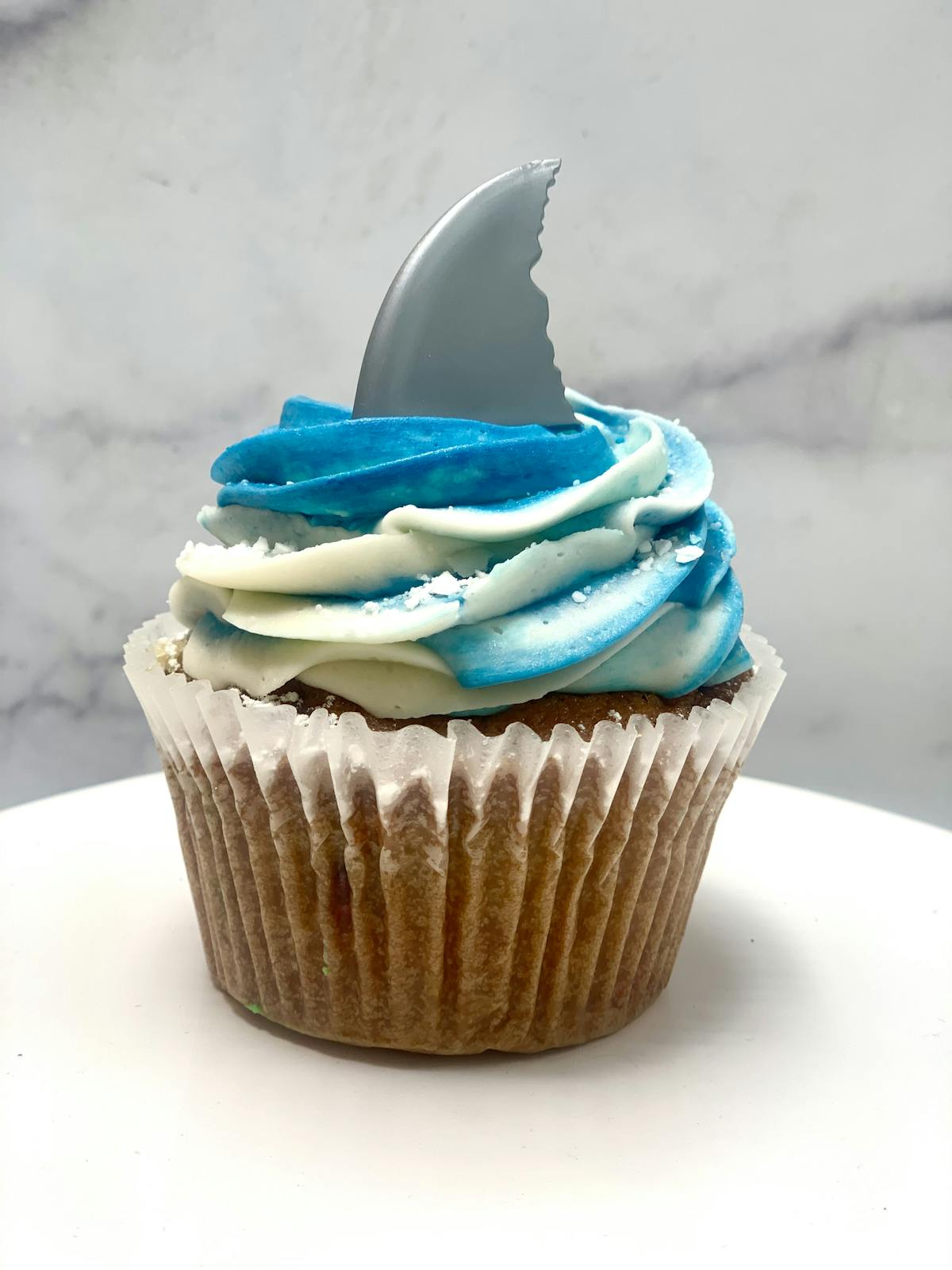 a blue and white cake