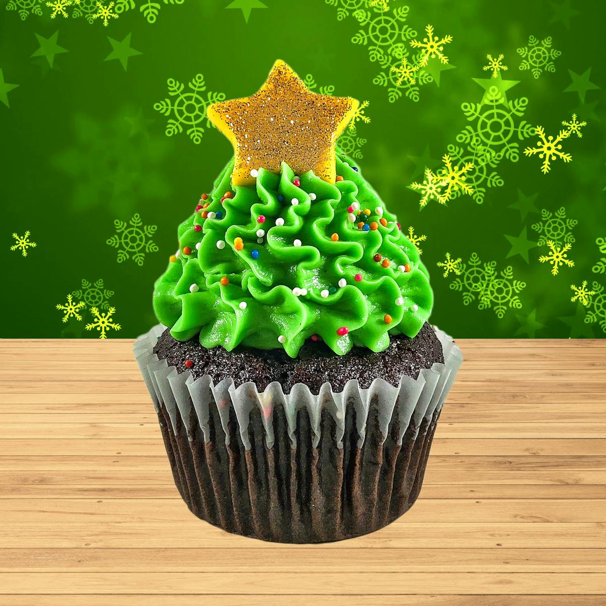 Gluten free and vegan chocolate cupcakes filled with vegan caramel, topped with vegan green frosting, rainbow nonpareil sprinkles and a shimmery gold star. Just like a Christmas tree!