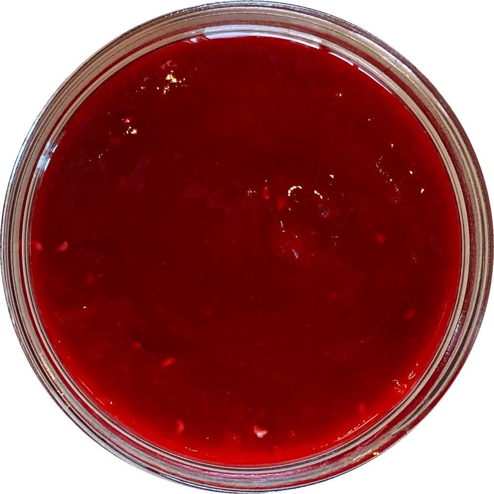 a close up of a sauce cup