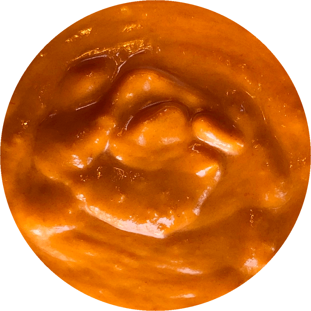 a close up of a sauce cup