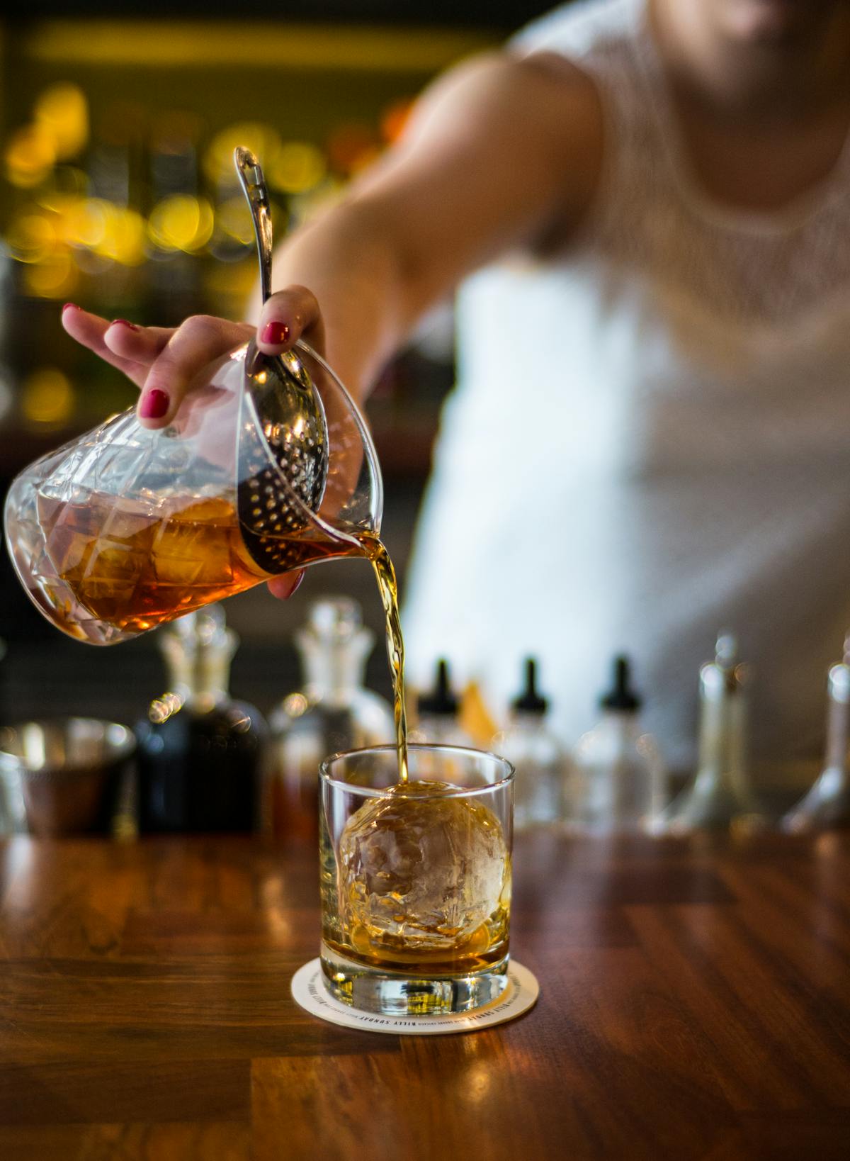 a bartender making a cocktail