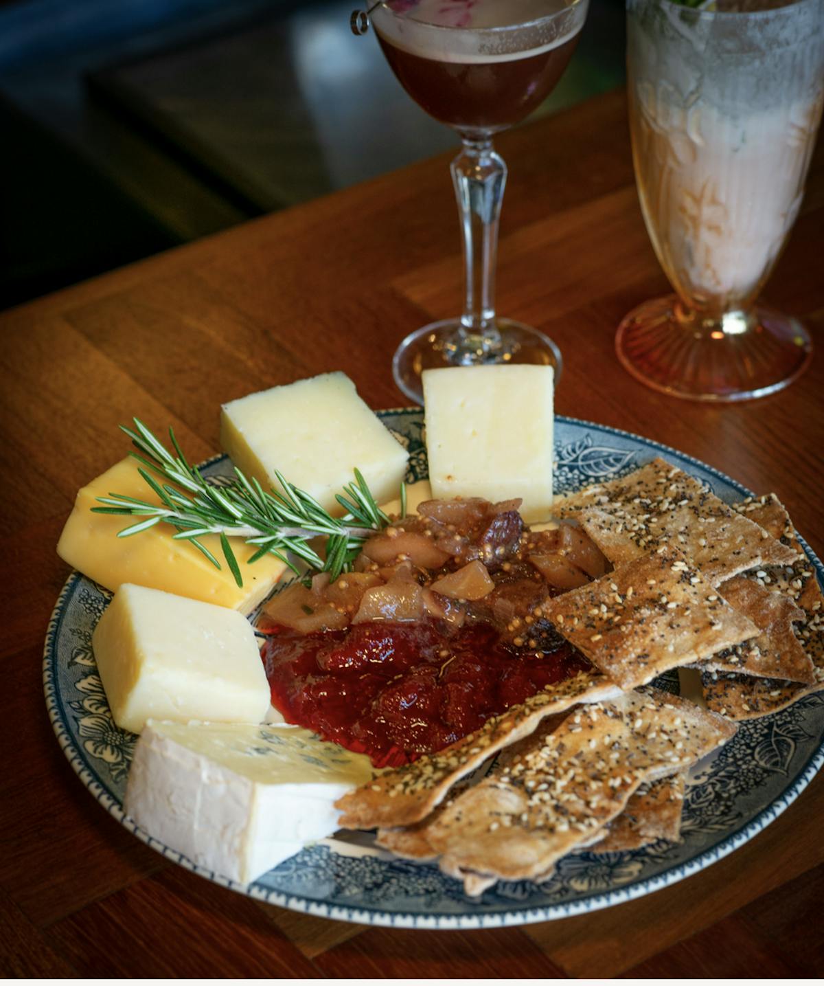 a plate of food sitting on top of a wooden table