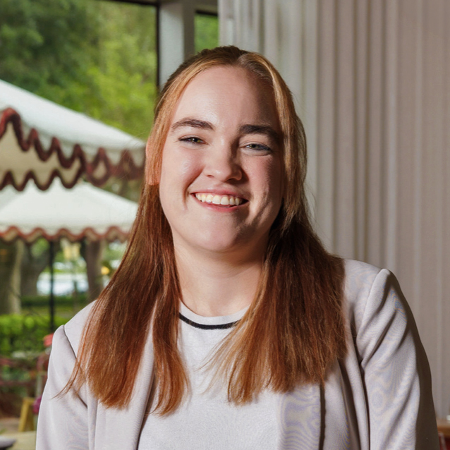 a woman smiling at camera