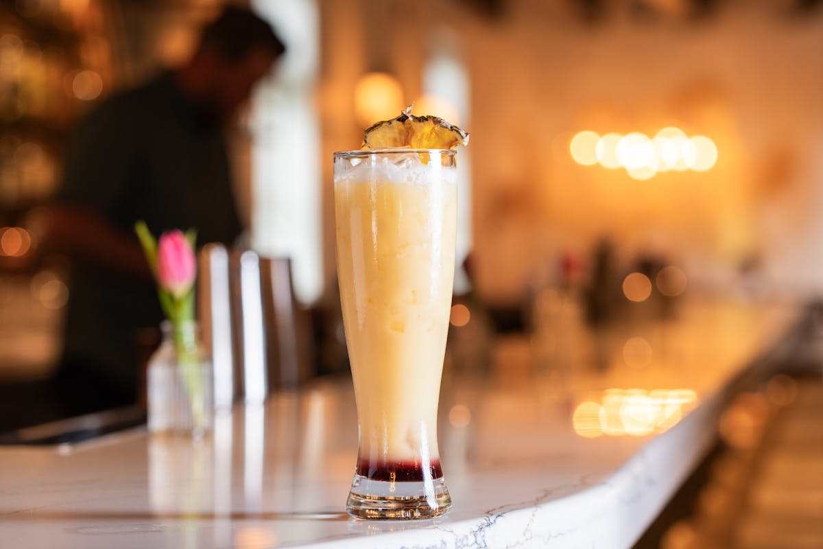 a glass cup on a table