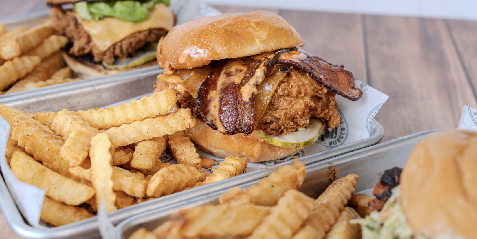 a tray of food with a burger and fries