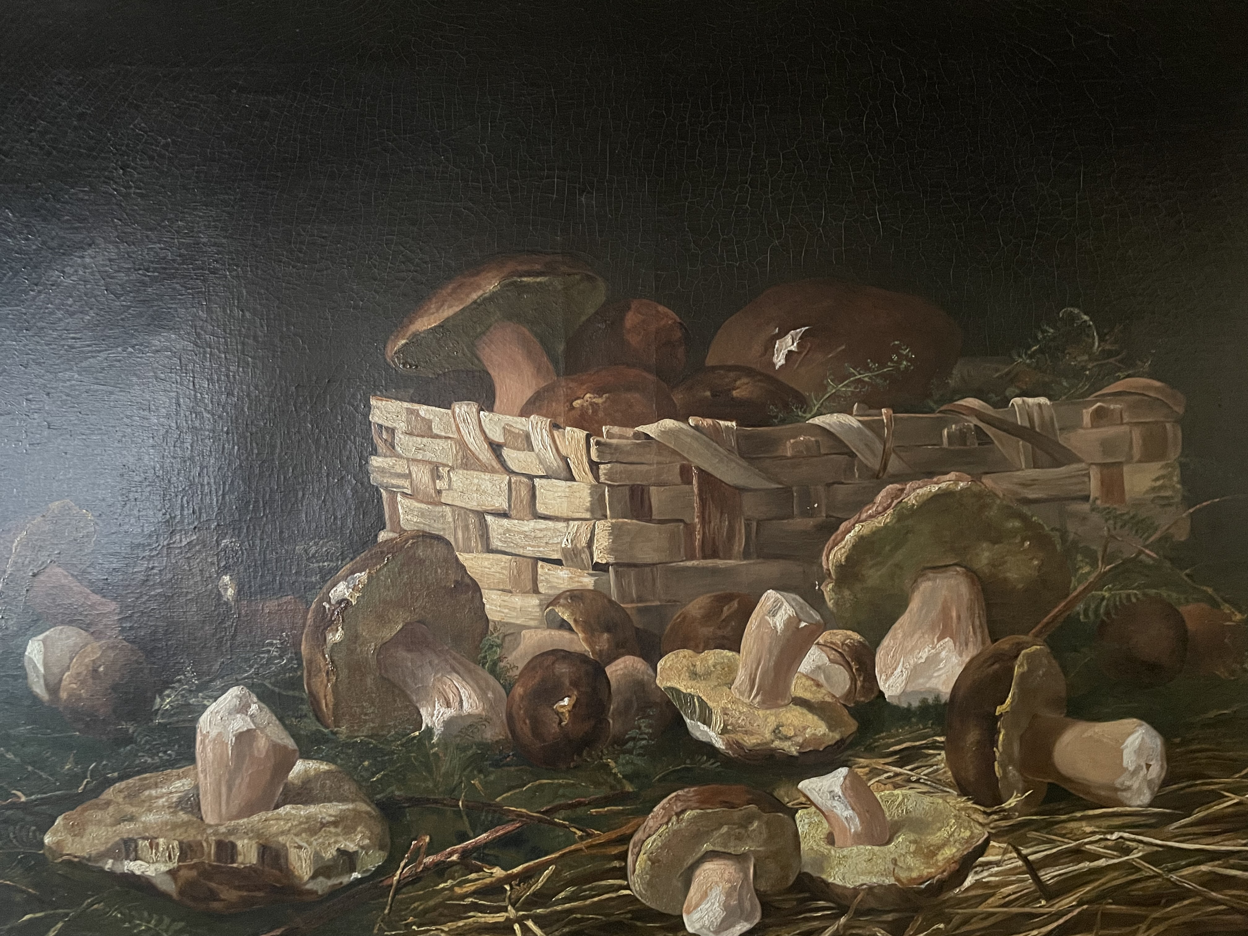 a group of men sitting on a rock