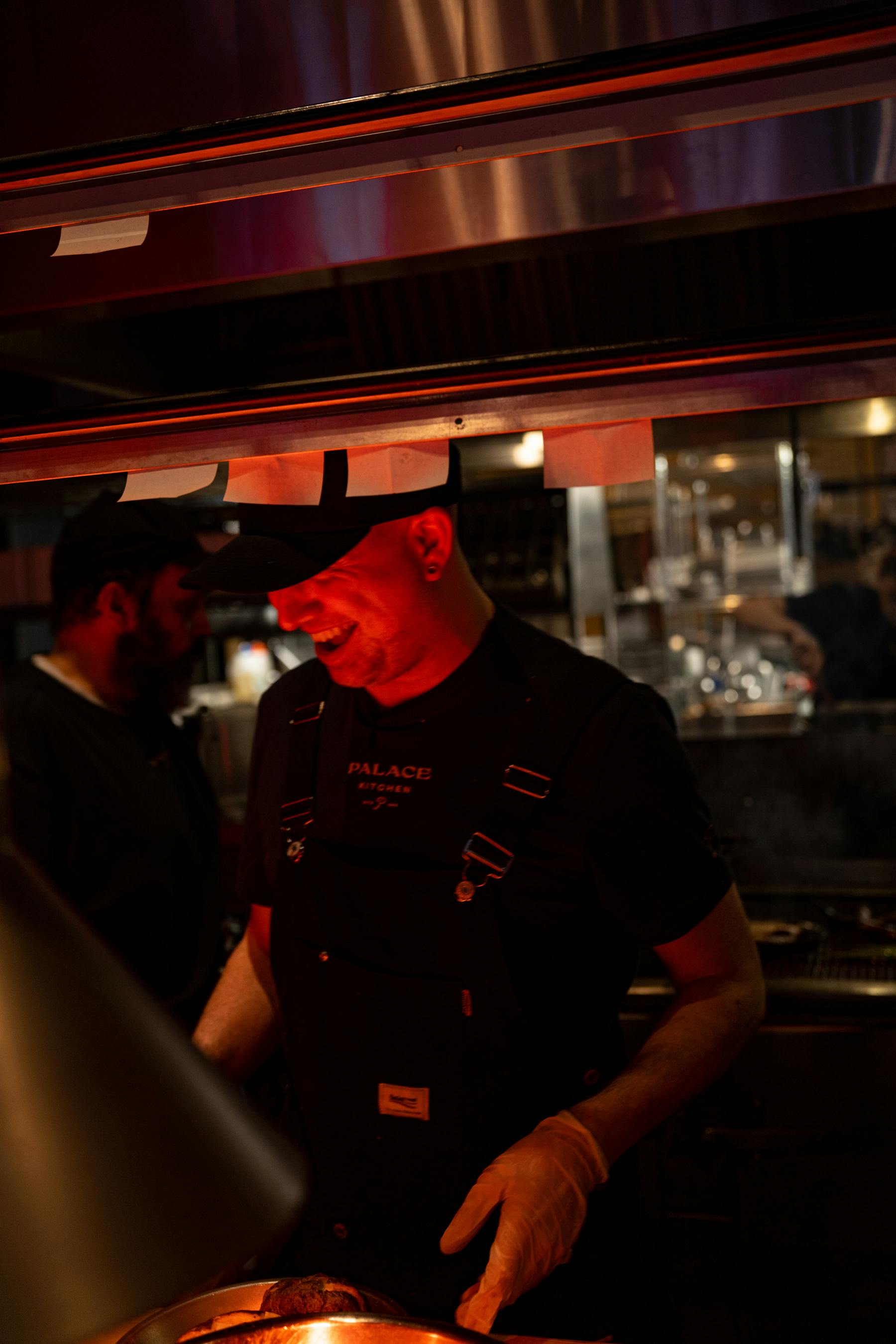 a man cooking in a kitchen