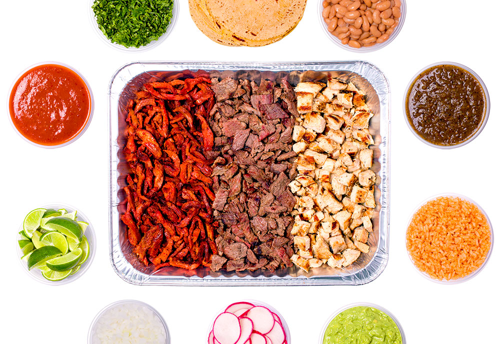 Tacomasa serving a variety of meat for taco platter catering near Long Beach CA.