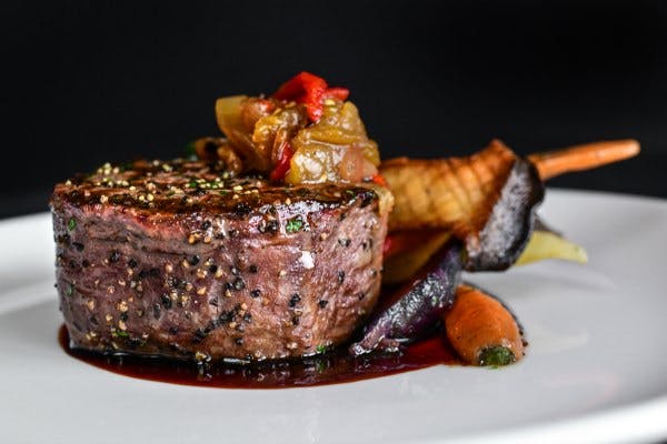 a piece of steakon a plate