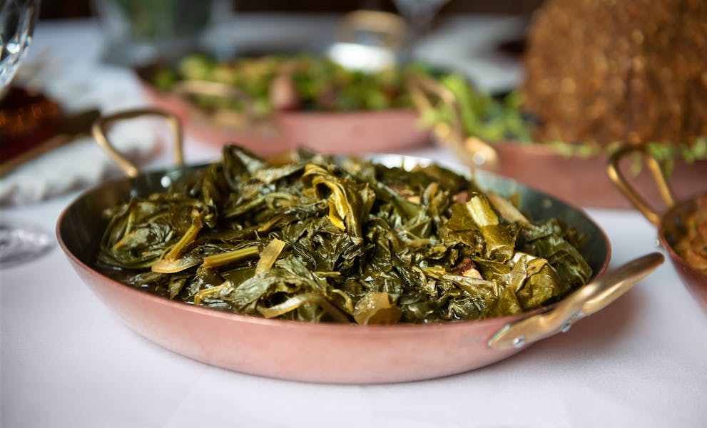 BaconBraised Mustard & Collard Greens Brennan's of Houston The