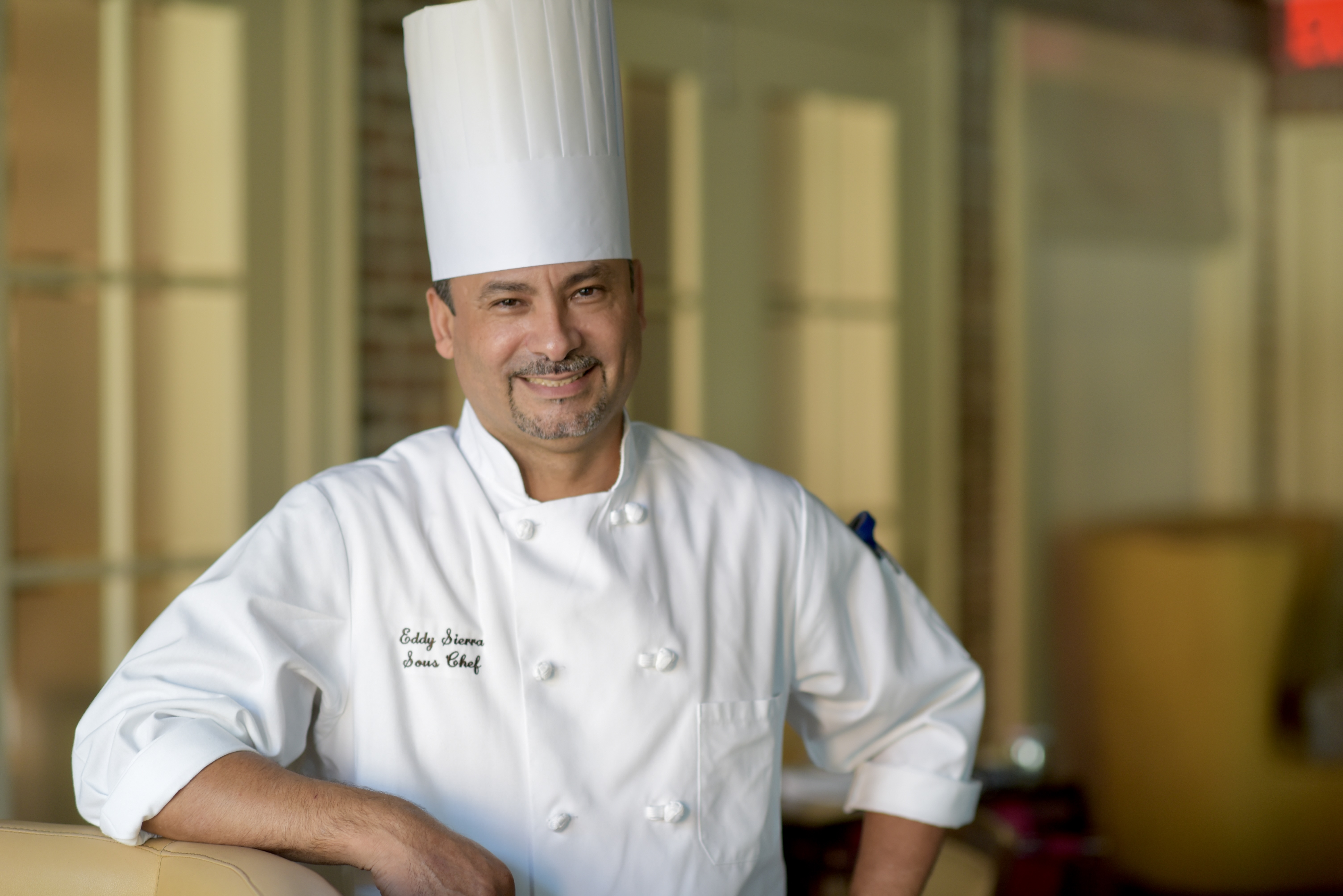 a man standing in a kitchen