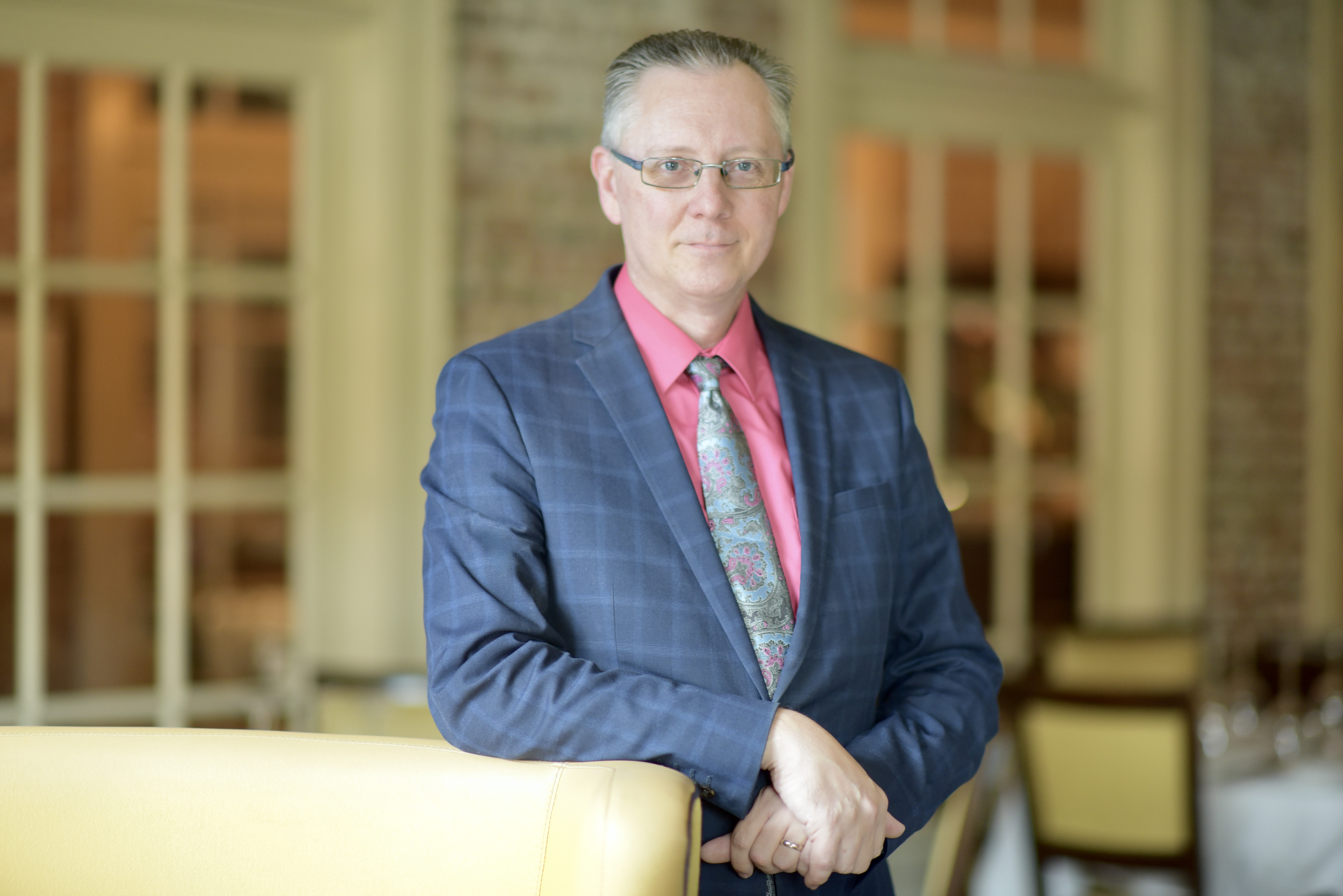 a man wearing a suit and tie
