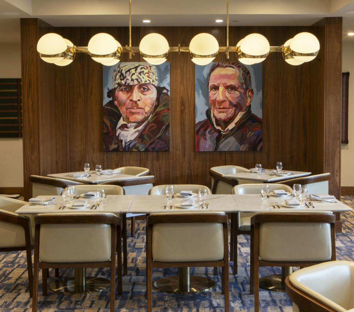 Portraits of Alice B. and Gertrude Stein by artist Jo Hay at Alice B. restaurant in Palm Springs