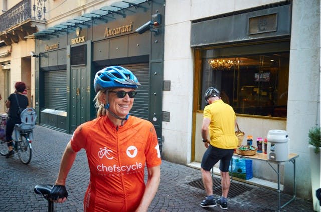 a women riding a bicycle