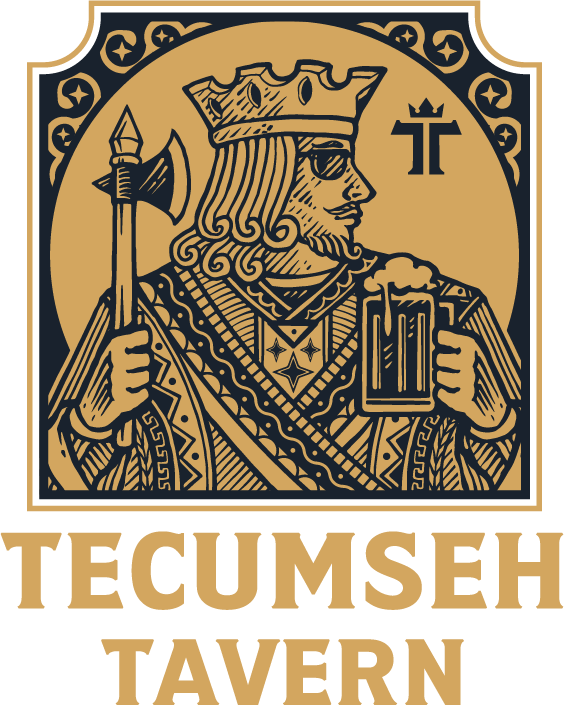 a man holding an axe and a glass of beer