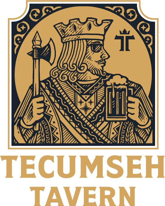 a man holding an axe and a glass of beer