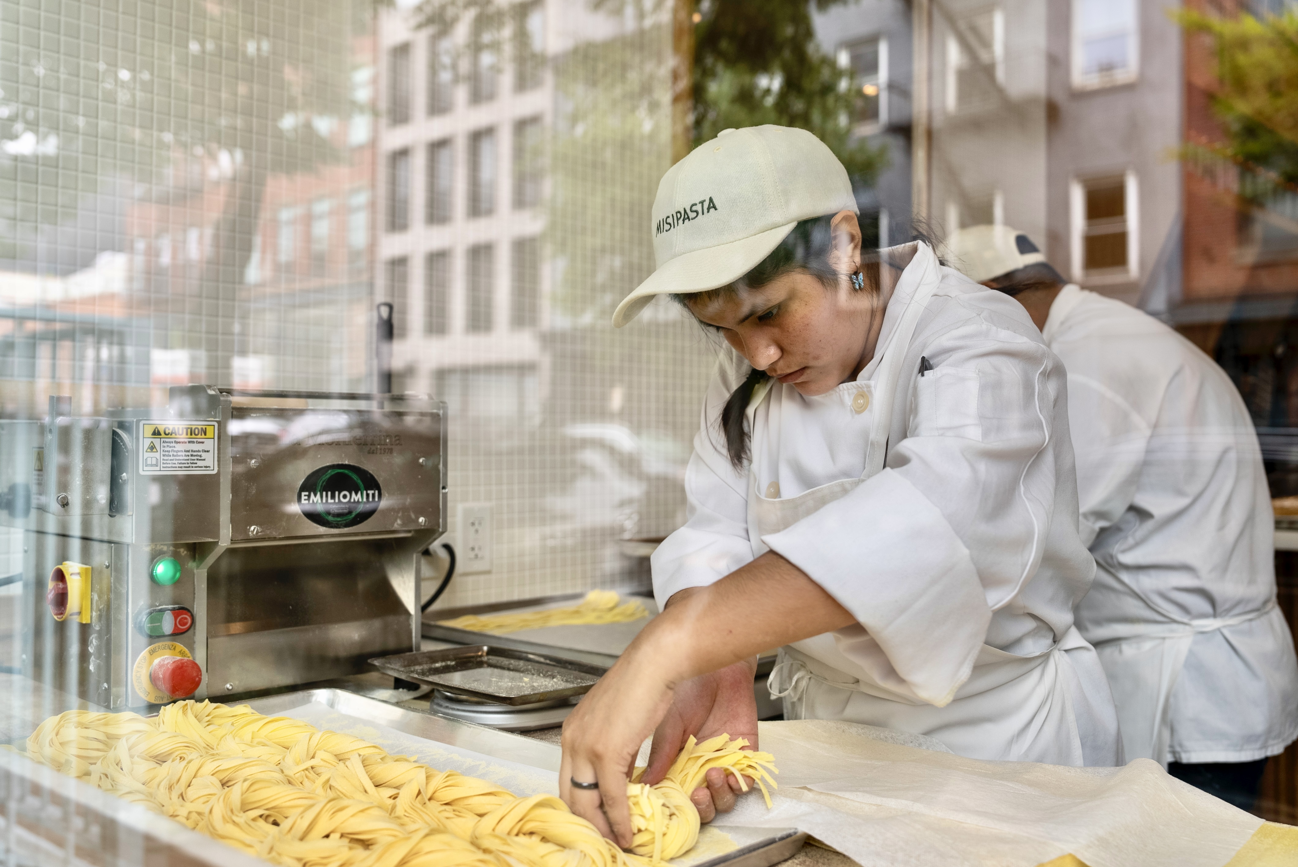 a person preparing food in a kitchen