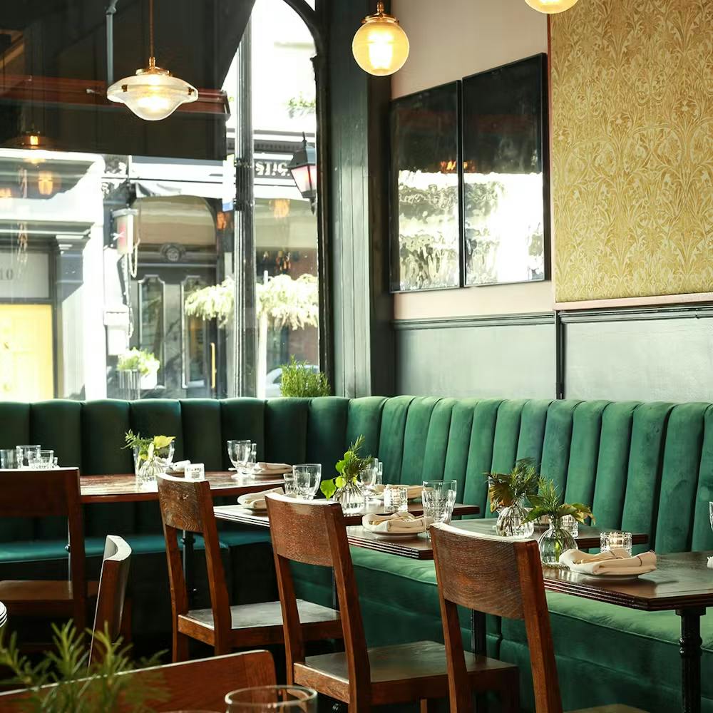 a room filled with furniture and a table