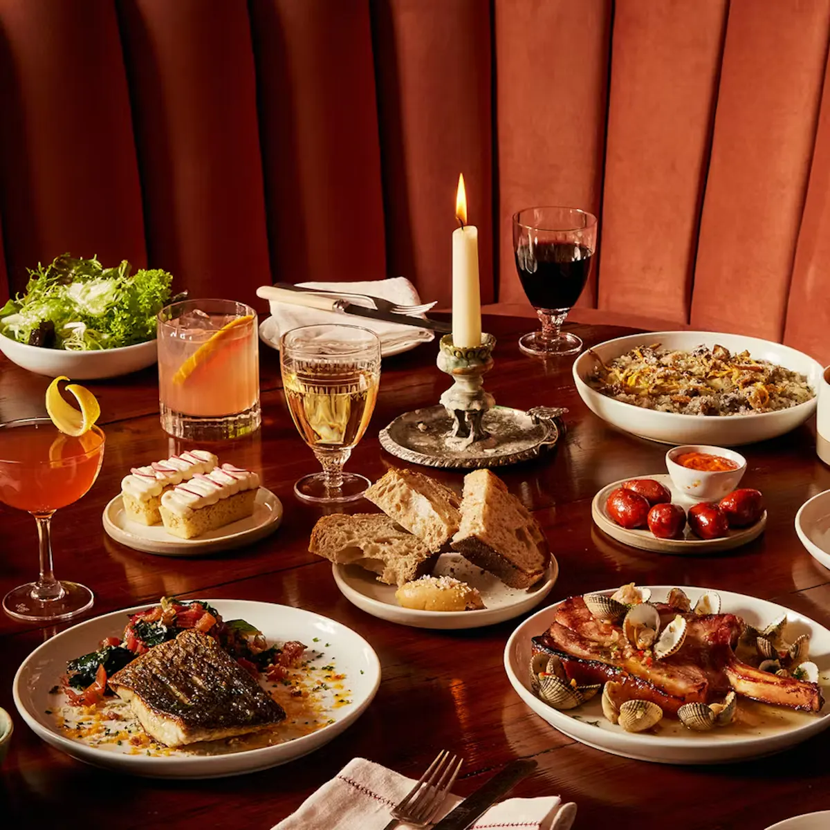 a table at Cora Pearl topped with different types of food on a plate