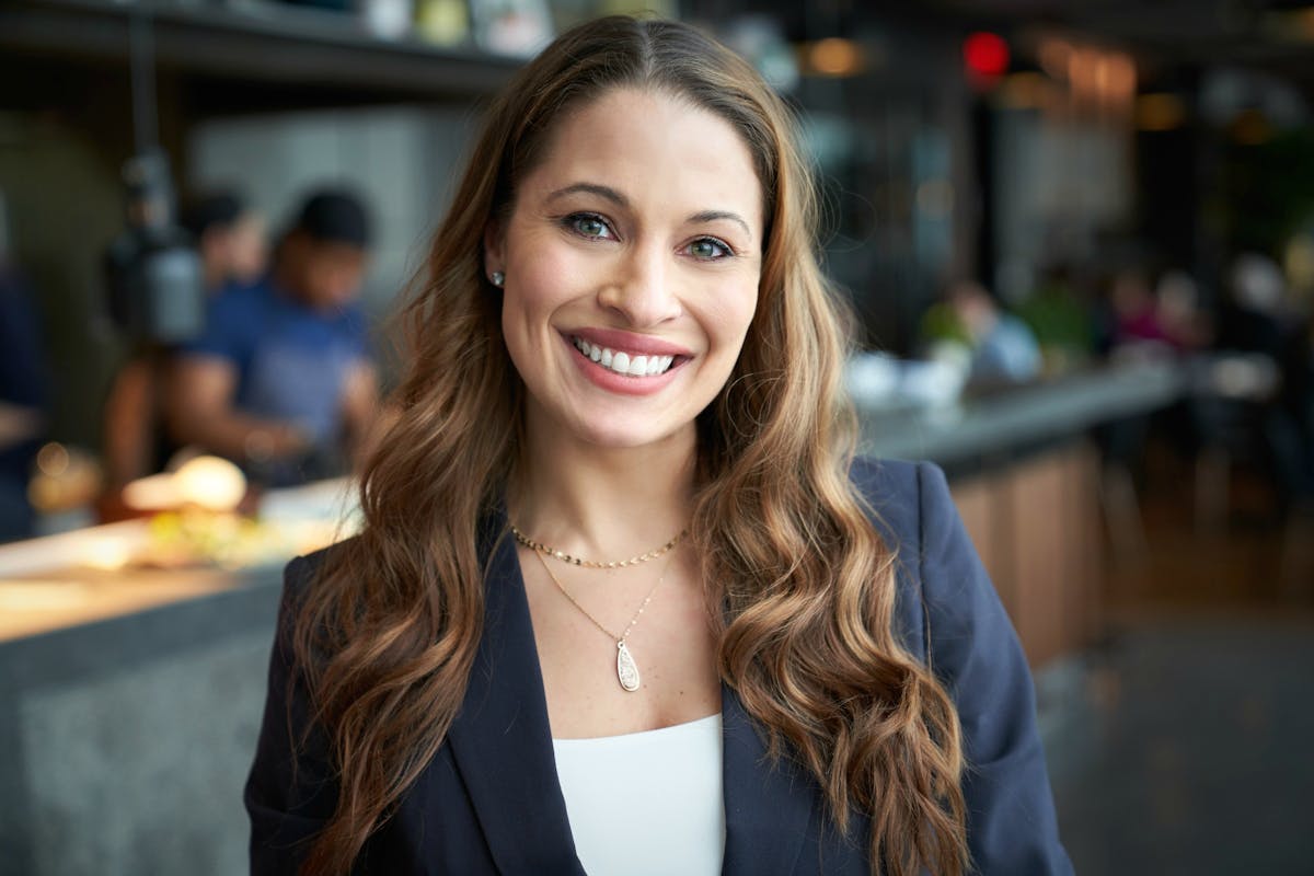 a woman smiling for the camera