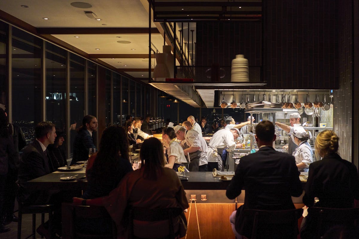 a group of people in a restaurant