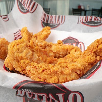 a person holding a plate of food