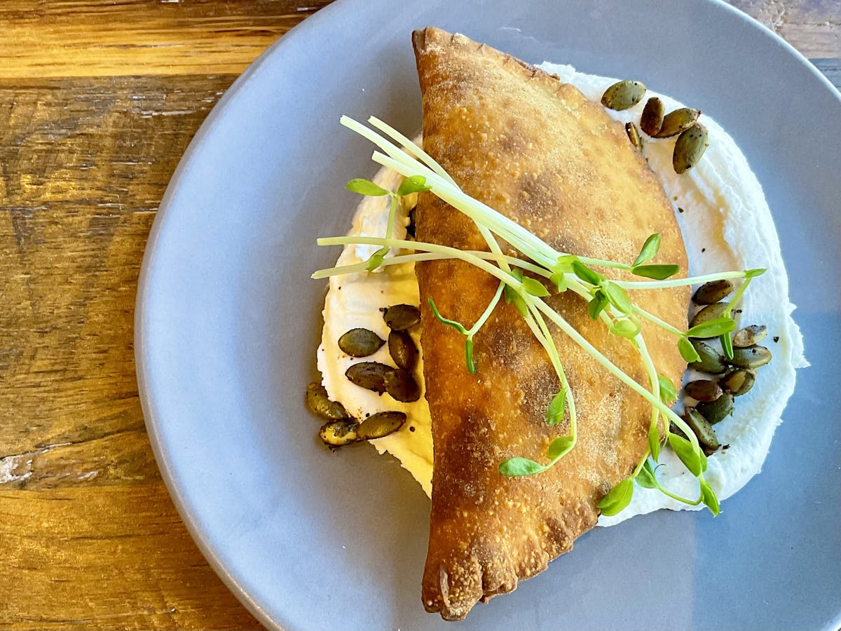 a sandwich cut in half on a plate