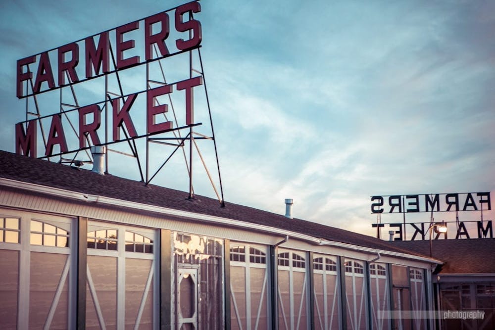 a sign on the side of a train station