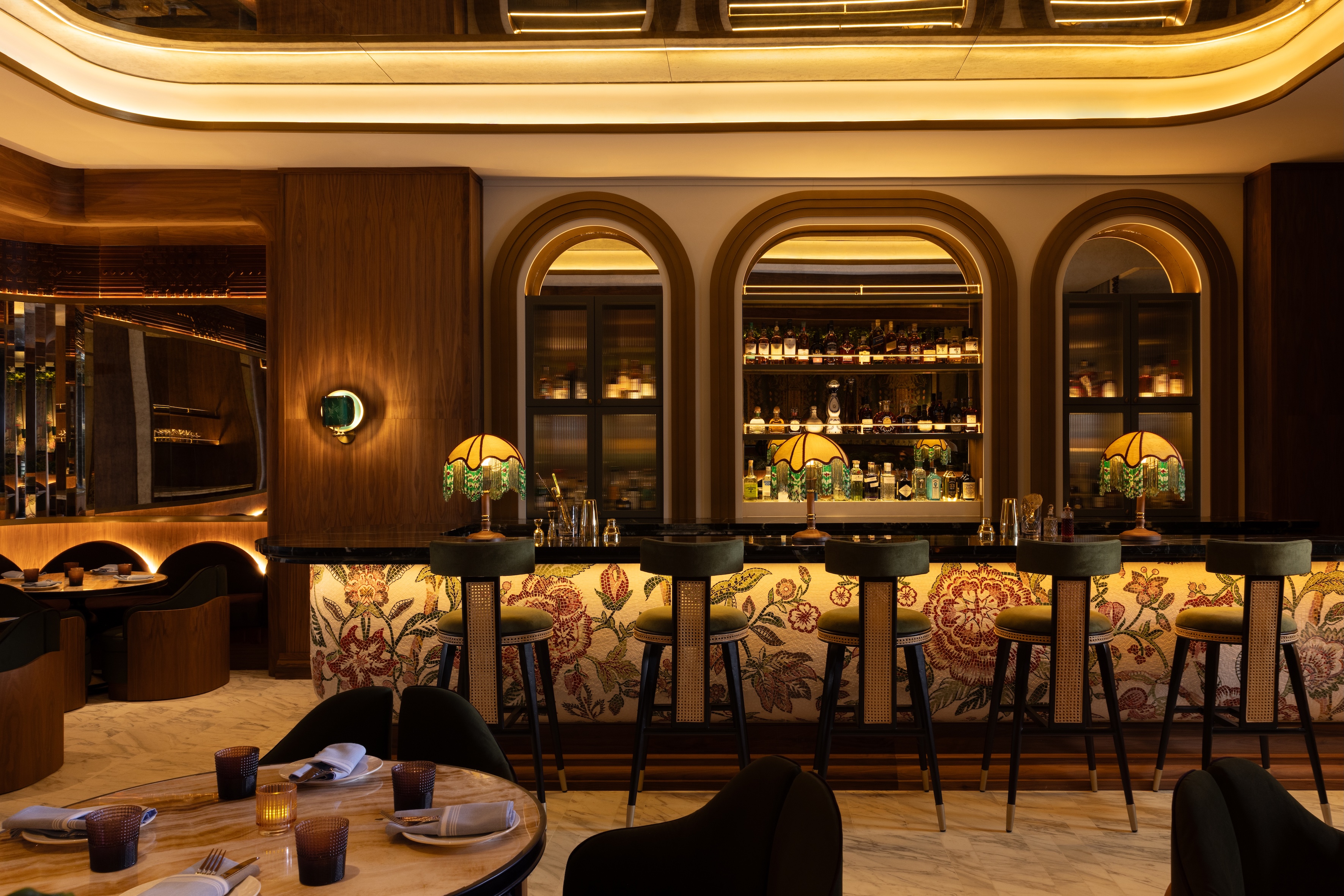 a bar with tables and chairs