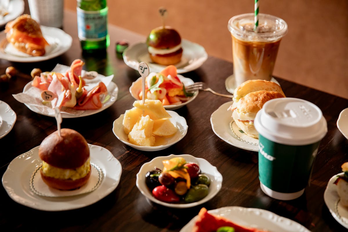 a table topped with plates of food on a plate